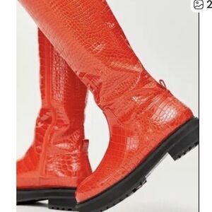 Urban Outfitters Dark Red Orange Croc-Embossed Knee-High Platform Boots. NWT
